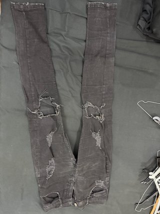 Pantalones vaqueros desgastados