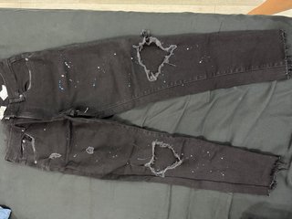 Pantalones vaqueros desgastados