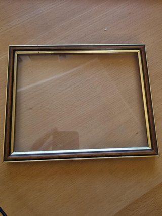 Cornici in legno marrone e oro