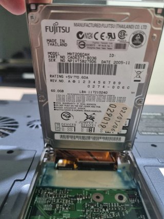 Portatil notebook d4f con cargador disco duro 60GB