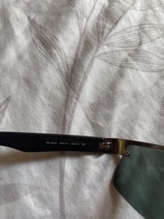 Gafas de sol Ray-Ban negras y verdes