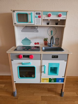 Cocina infantil de madera con accesorios