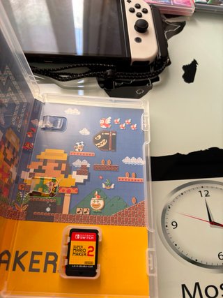 Nintendo Switch OLED + 5 Juegos