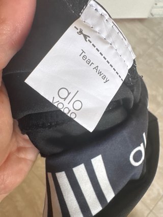Pantaloni Alo neri con banda a righe