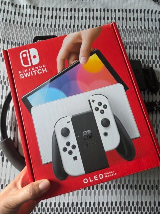 Nintendo Switch OLED + Ring Fit Adventure