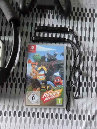 Nintendo Switch OLED + Ring Fit Adventure