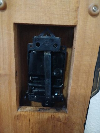 Reloj de pared con péndulo