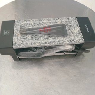 Plancha de piedra con accesorios