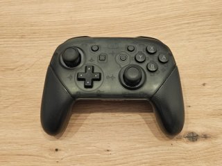 Pacchetto Nintendo Switch OLED Nero/Rosso