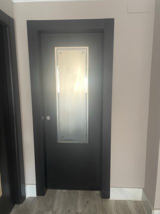 Puerta corredera con cristal