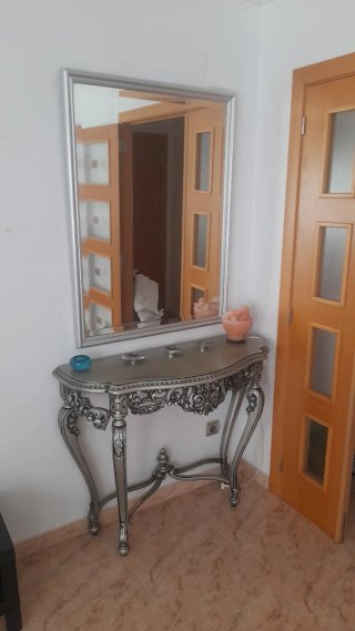 Recibidor de diseño plateado