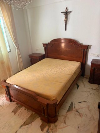 Dormitorio madera clásico