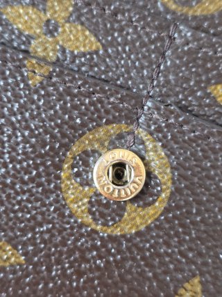 Cartera Louis Vuitton con cadena