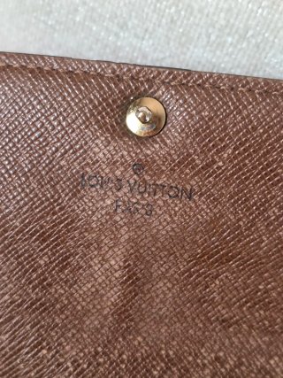 Cartera Louis Vuitton con cadena