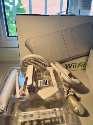 Consola Wii con 2 mandos y accesorios