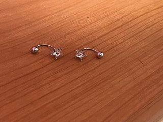 Pendientes aro abierto estrella circonita