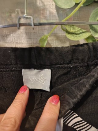 Shorts KIX negros con estampado geométrico talla L