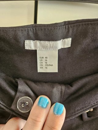 Pantalón fino negro con cinturón