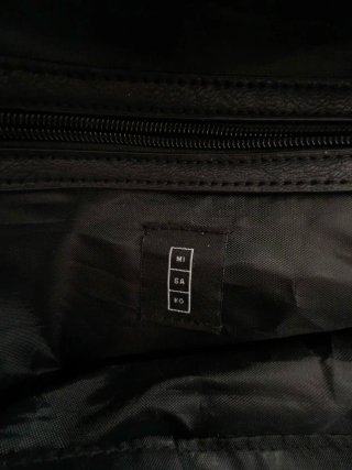 Bolso viaje Misako Negro y Camel Nuevo