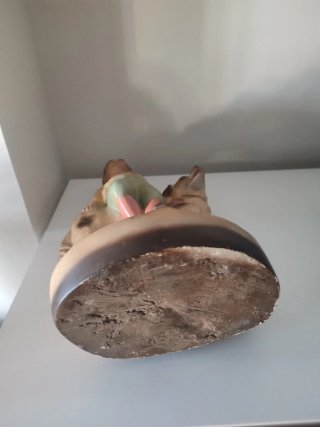 Figura antigua niño con perro