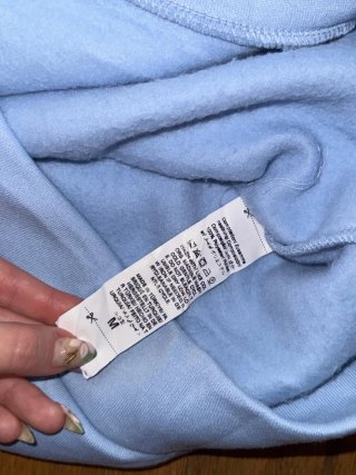 Sudadera azul con estampado Angel