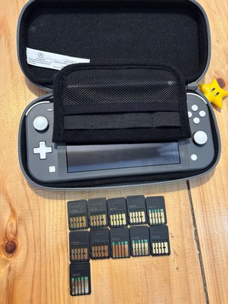 Nintendo Switch Lite Gris + 11 Juegos