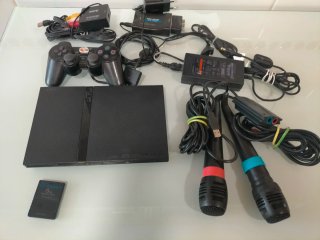 Console PlayStation 2 + 2 controller + giochi