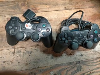 Console PlayStation 2 + 2 controller + giochi