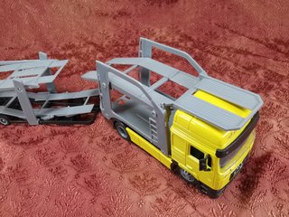 Camión Portacoches MAN 1:43 New Ray