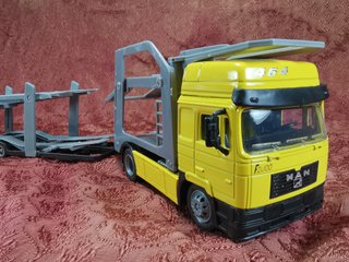 Camión Portacoches MAN 1:43 New Ray
