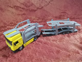 Camión Portacoches MAN 1:43 New Ray