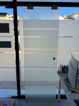 Puerta corredera de cristal