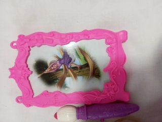 Muñeca Rapunzel con vestido morado