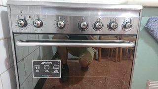 Cocina inducción y horno SMEG C6IMXM2