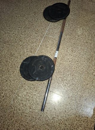 Barra de pesas con discos