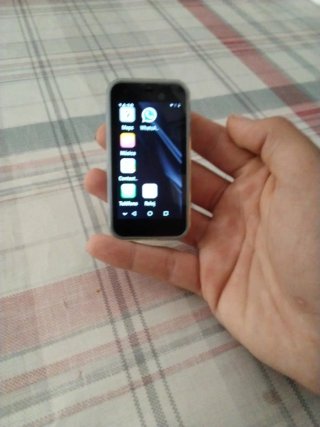 Mini móvil azul claro, como nuevo