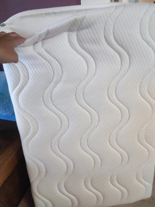 Colchón de espuma para mini cuna.