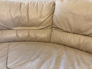 Sofá esquinero de piel beige