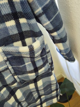 Bata de hombre nueva con etiqueta
