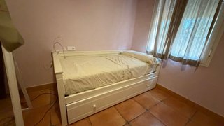 Cama nido de madera blanca, del corte inglés.