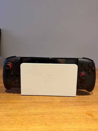 Nintendo Switch OLED bianca + dock + controller HORI