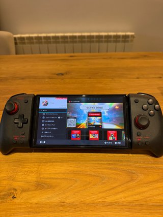 Nintendo Switch OLED bianca + dock + controller HORI