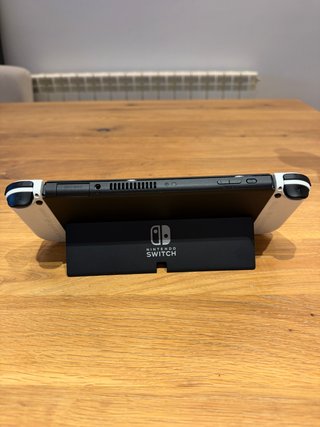 Nintendo Switch OLED bianca + dock + controller HORI