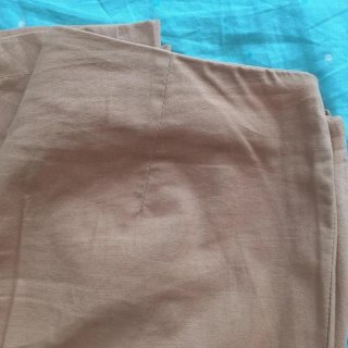 Pantaloni beige gamba ampia