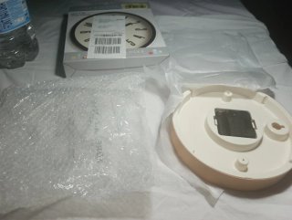 Reloj de pared redondo naranja