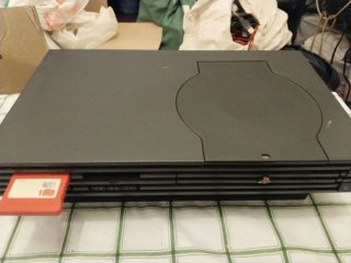 Lote PlayStation 2 con accesorios