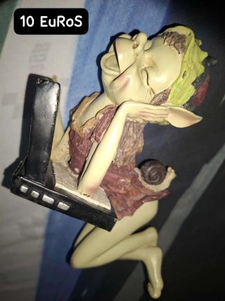 Figura Elfo con Piano y Caracol