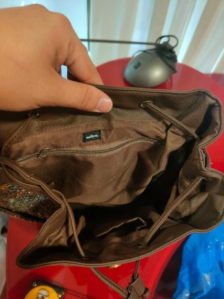 Mochila Marrón y Multicolor.
