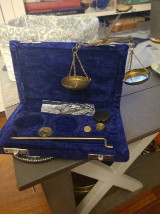 Mini romana de latón con estuche