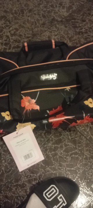 Saco Naf Naf floral con ruedas